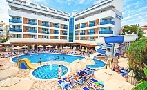  All Inclusive почивка в BLUE WAVE SUITE HOTEL 4*, Алания, Турция. Чартърен полет от София + 7 нощувки на човек+ 2 басейна 