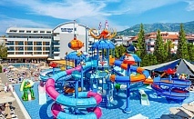  All Inclusive почивка в BLUE WAVE SUITE HOTEL 4*, Алания, Турция. Чартърен полет от София + 7 нощувки на човек+ 2 басейна 