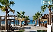 Еднодневен плаж до Гърция-Офринио! Безкрайна пясъчна ивица, плаж със син флаг, спокойствие, чист въздух, тристическа програма и транспорт от Роял Холидейз