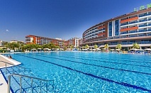  21.04 в хотел Lonicera Resort & Spa 5*, Алания, Турция! Автобусен транспорт + 7 нощувки на човек на база Ultra All Inclusive. Дете до 13.99г. безплатно! 