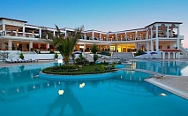 На море в Гърция през м.Август! 4 нощувки със закуски и вечери в хотел Alexandros Palace 5*, Халкидики!