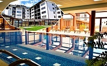  Нощувка на човек със закуска + отопляем вътрешен басейн и релакс зона + 16 местно минерално джакузи от хотел Роял Банско Апартмънтс. Дете до 11.99г. - безплатно! 