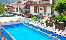  Нощувка за двама със закуска + 2 топли минерални басейна и СПА зона от хотел Аквилон Резидънс & СПА, с. Баня 