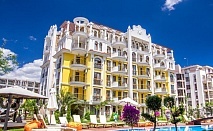  Нощувка за 2-ма възрастни с 2 деца до 11.99г. или 3-ма възрастни + басейн в хотел Хармони Суитс Монте Карло,  Слънчев бряг 