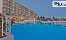На първа линия в о-в Евия, Гърция! 5 или 7 нощувки на база All Inclusive + басейн, чадър и шезлонг в Palmariva Beach Hotel 4*, от Ambotis Holidays