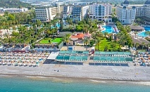  На ПЪРВА ЛИНИЯ в STELLA BEACH HOTEL 5*, Алания, Турция. Чартърен полет от София + 7 нощувки на човек на база All Inclusive + басейни и водни пързалки 