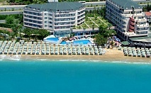  Почивка от август до октомври в ASKA JUST IN BEACH HOTEL 5*, Алания, Турция. Самолетен билет от София + 7 нощувки на човек на база All Inclusive! 