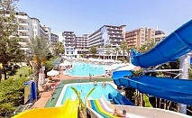  Почивка в Holiday Park Resort 5* Алания, Турция! Автобусен транспорт + 7 нощувки на човек на база All Inclusive. Дете до 11.99 г. БЕЗПЛАТНО! 