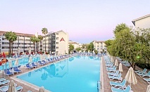  Почивка в хотел Armas Bella Sun 4*, Сиде, Турция! Автобусен транспорт + 7 нощувки на човек на база Ultra Аll Inclusive. Дете до 11.99г - безплатно! 