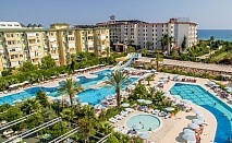  Почивка в хотел HEDEF RESORT & SPA 5* Алания, Турция! Автобусен транспорт + 7 нощувки на човек на база Ultra All Inclusive + басейни и водни пързалки. Дете до 11.99 г. БЕЗПЛАТНО! 