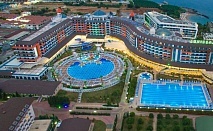  Почивка в хотел LONICERA WORLD RESORT & SPA 5* Алания, Турция! Автобусен транспорт + 7 нощувки на човек на база Ultra All Inclusive. Дете до 13.99 г. БЕЗПЛАТНО! 