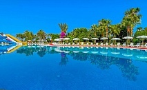  Почивка в хотел STELLA BEACH HOTEL 5*, Алания, Турция. Чартърен полет от София + 7 нощувки на човек на база All Inclusive + басейни и водни пързалки 