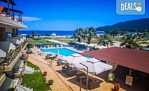 Почивка през септември в Hotel Rihios 3* в Ставрос, Гърция! 7 нощувки със закуски и вечери и възможност за организиран транспорт от Глобул Турс