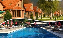  Почивка в Рибарица! Нощувка на база All Inclusive light + външен басейн в Комплекс Green Village, Рибарица. Дете до 12г. – БЕЗПЛАТНО! 