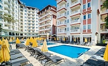  Почивка в VILLA SUN FLOWER BEACH HOTEL 4*, Алания, Турция! Автобусен транспорт + 7 нощувки на човек на база Ultra All Inclusive. 