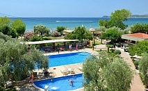  Ранни записвания на първа линия в Atrium Beach Hotel****, Тасос, Гърция! Нощувка на човек със закуска + басейни в Потос 