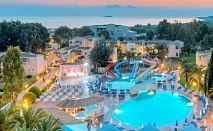 6-ти септември в Гърция - Хотел Aquis Sandy Beach Resort 4*, Корфу! 4 нощувки на база All Inclusive + голям плувен басейн, близо до плажа и невероятна гледка!