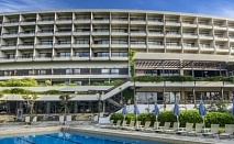 6-ти септември на Корфу - Хотел Corfu Holiday Palace ***** на метри от плажа! 3 Нощувки със закуски и вечери + ползване на открит и закрит басейн!