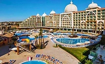  Ultra All Inclusive за ДВАМА + аквапарк в ALAN XAFIRA DELUXE RESORT & SPA 5*, Алания, Турция. Чартърен полет от София + 7 нощувки 