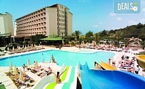 ULTRA ALL INCLUSIVE морв 2023 г! Пет звездна морска ваканция в Beach Club Doganay 5*! 7 нощувки, басейн, водни пързалки, безплатно за дете до 12.99 г. и транспорт от BelpregoTravel