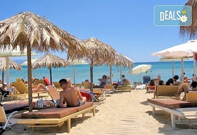 За 1 ден на плаж в слънчева Гърция - Ammolofi Beach, Неа Перамос! Транспорт, застраховка и водач!