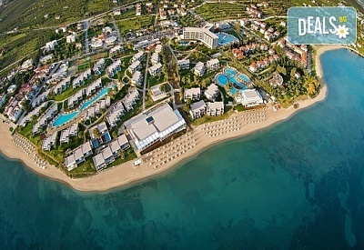 Нощувка на човек на база All inclusive в Ikos Olivia, Халкидики