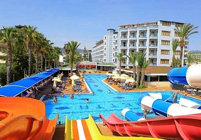  Почивка в хотел Caretta beach 4*, Алания, Анталия! Автобусен транспорт + 7 нощувки на база Аll Inclusive на човек + басейн и водни пързалки. Дете до 11.99г. безплатно 