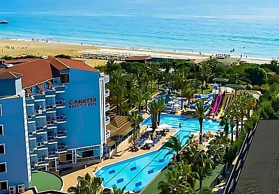  Ранни записвания за лято 2025 на 1-ва линия в хотел Caretta beach 4*, Алания, Анталия! Автобусен транспорт + 7 Аll Inclusive нощувки на човек + басейн и пързалки 